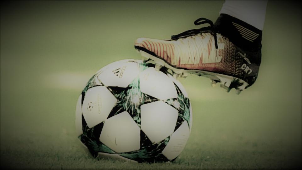 Soccer ball and shoes image